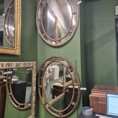 Lot 402 - Two oval gilt Georgian style mirrors, Brights...