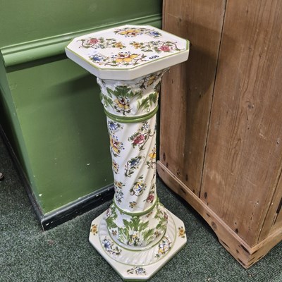 Lot 406 - A pottery plant stand with floral decoration H...