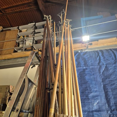 Lot 412 - A quantity of billiard or snooker cues, rests,...