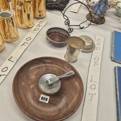 Lot 809 - A sterling silver beaker, a nut cracker, and a...