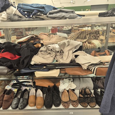 Lot 831 - A large selection of fashion clothing etc.