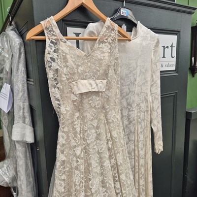 Lot 313 - Two wedding type dresses, one silk with long...