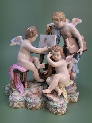 Lot 1821 - A Meissen gorup of four amorini representing...