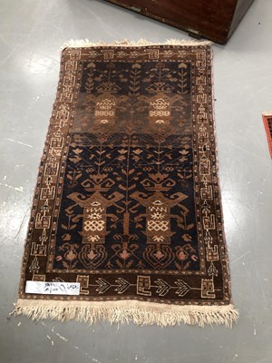 Lot 431 - A Belouche tribal rug 142 × 90cm