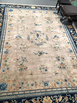 Lot 421 - An antique Oriental carpet of Chinese design...