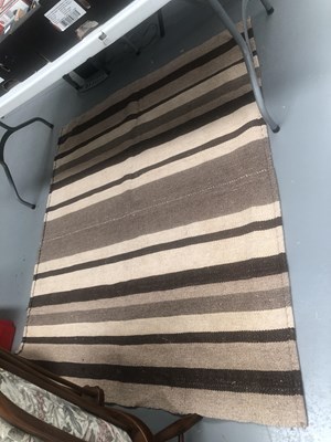 Lot 416 - A tribal flat woven panel 167  × 138cm