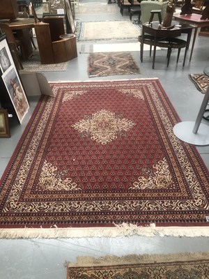 Lot 439 - A machine made carpet of Persian design 296 ×...