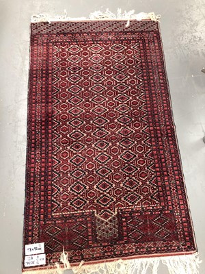 Lot 438 - An Oriental rug of Turkamen design 158 × 92cm