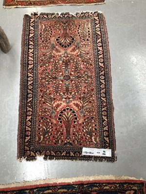 Lot 435 - A Persian Sarouk mat 118 × 68cm