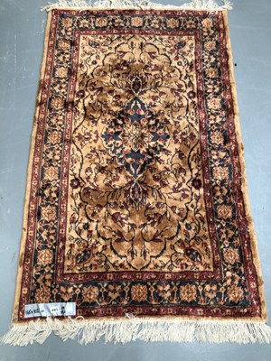 Lot 443 - A machine made rug of Persian design 165 × 102cm