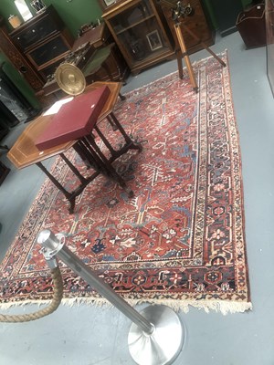 Lot 413 - An antique Persian Heriz carpet 315 × 227cm
