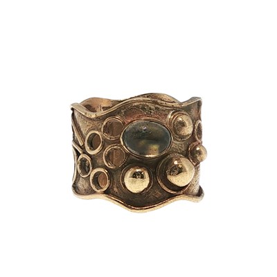 Lot 10 - A 9ct gold dress ring of abstract design with...