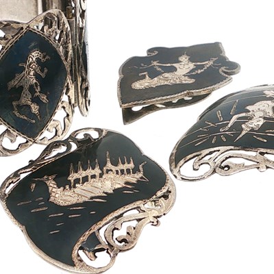 Lot 19 - A Niello-decorated pierced-panel bracelet, a...