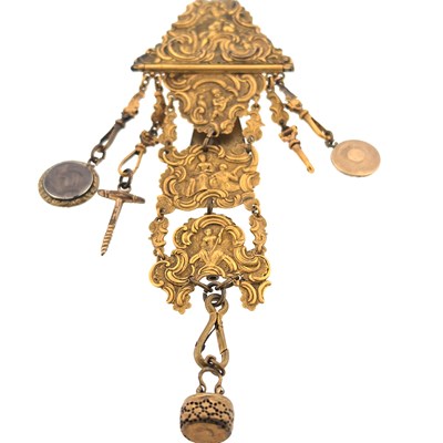 Lot 41 - An antique gilt-metal chatelaine clip cast...