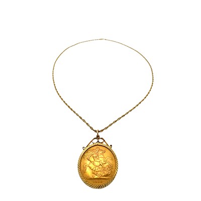 Lot 43 - A 1968 full sovereign 22ct gold coin held in a...