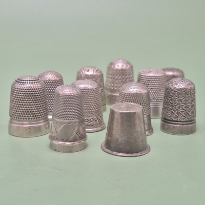 Lot 47 - Twelve silver thimbles, unhallmarked, assessed...