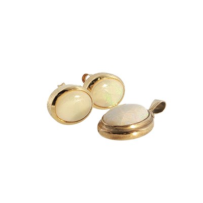 Lot 79 - A pair of stud earrings set with cabochon...