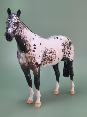 Lot 1842 - A Beswick pottery dappled grey horse standing...