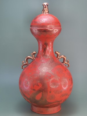 Lot 1849 - A Chinese coral ground baluster vase and cover...