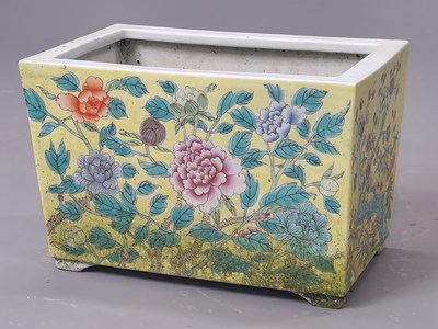 Lot 1852 - A Chinese yellow ground planter of rectangular...