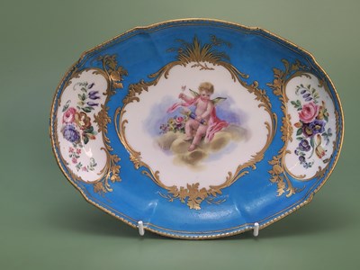 Lot 1857 - A Sevres sky blue ground oval dish, date...