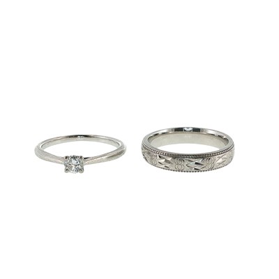 Lot 100 - A platinum and diamond bridal set: the...