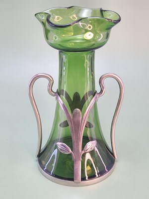 Lot 1861 - A German Art Nouveau green glass crocus vase...
