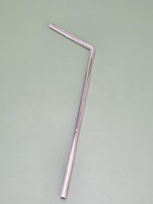 Lot 107 - A hallmarked silver drinking straw set with a...
