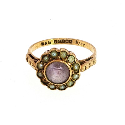 Lot 129 - A 9ct gold amethyst and seed pearl cluster...