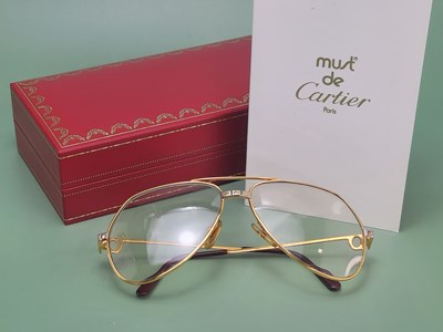 Lot 142 - Vintage Cartier Santos glasses the gold tone...