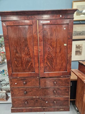 Lot 250 - A Victorian mahogany linen press, the twin...