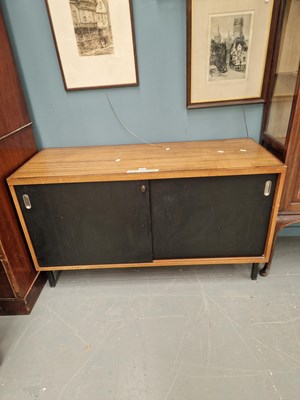 Lot 252 - A mid century teak and painted sideboard on...