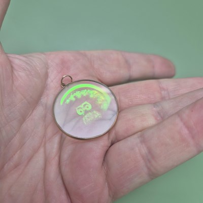 Lot 164 - A vintage holographic owl pendant within a 9ct...