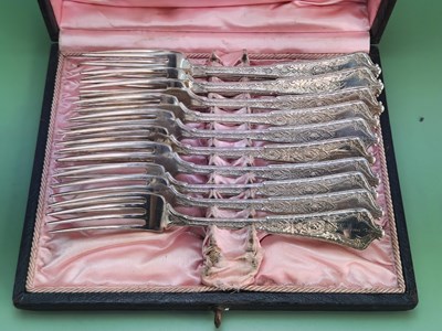 Lot 168 - A boxed set of twelve 19th-century Tiffany &...