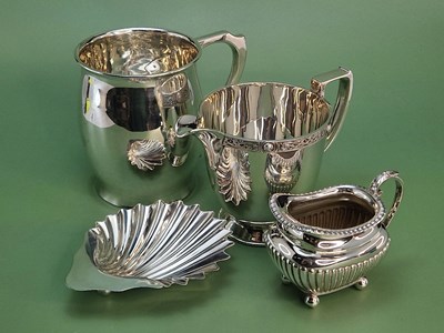 Lot 171 - Hallmarked silver to include a tankard, cream...