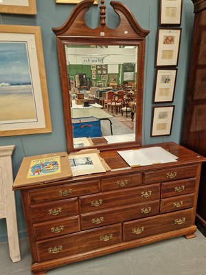 Lot 265 - A 20th century elm sideboard with a crested...