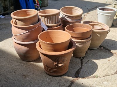 Lot 478 - Sixteen terracotta garden pots of various designs