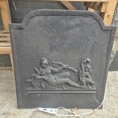 Lot 474 - A cast iron fireback depicting Greek figures...