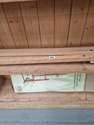 Lot 281 - A folding wooden artist's easel and a table...