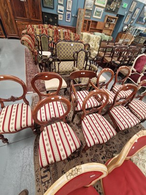 Lot 284 - A set of eight mahogany balloon back side...