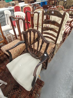 Lot 288 - An antique rush seat ladderback chair in the...