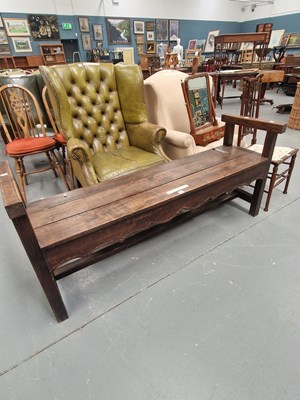 Lot 295 - A French oak bench, the three plank seat on...
