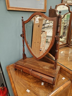 Lot 312 - An Edwardian mahogany shield shape swing...