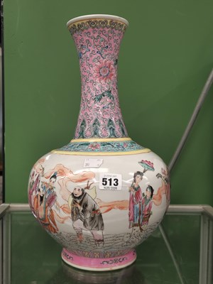 Lot 513 - A Chinese bottle vase, the body painted with...
