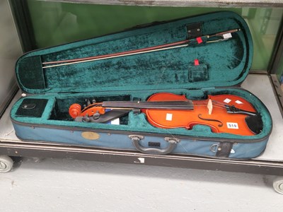 Lot 519 - A canvas cased Stentor violin and a bow