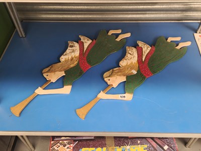 Lot 539 - Two carved and painted angels in flight as...