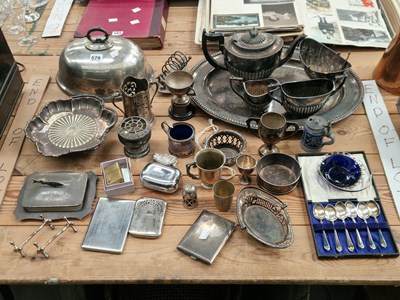 Lot 579 - Electroplate: a three piece tea set, an oval...