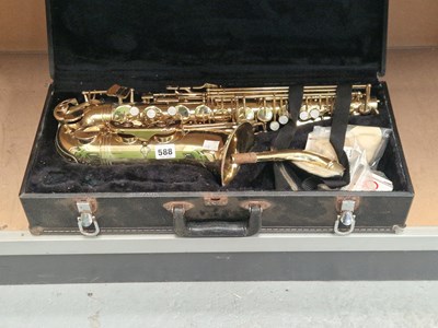 Lot 588 - A cased brass saxophone