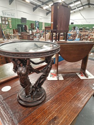 Lot 365 - A bronze effect composition occasional table,...