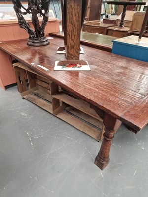 Lot 366 - A vintage oak refectory table, the adzed...